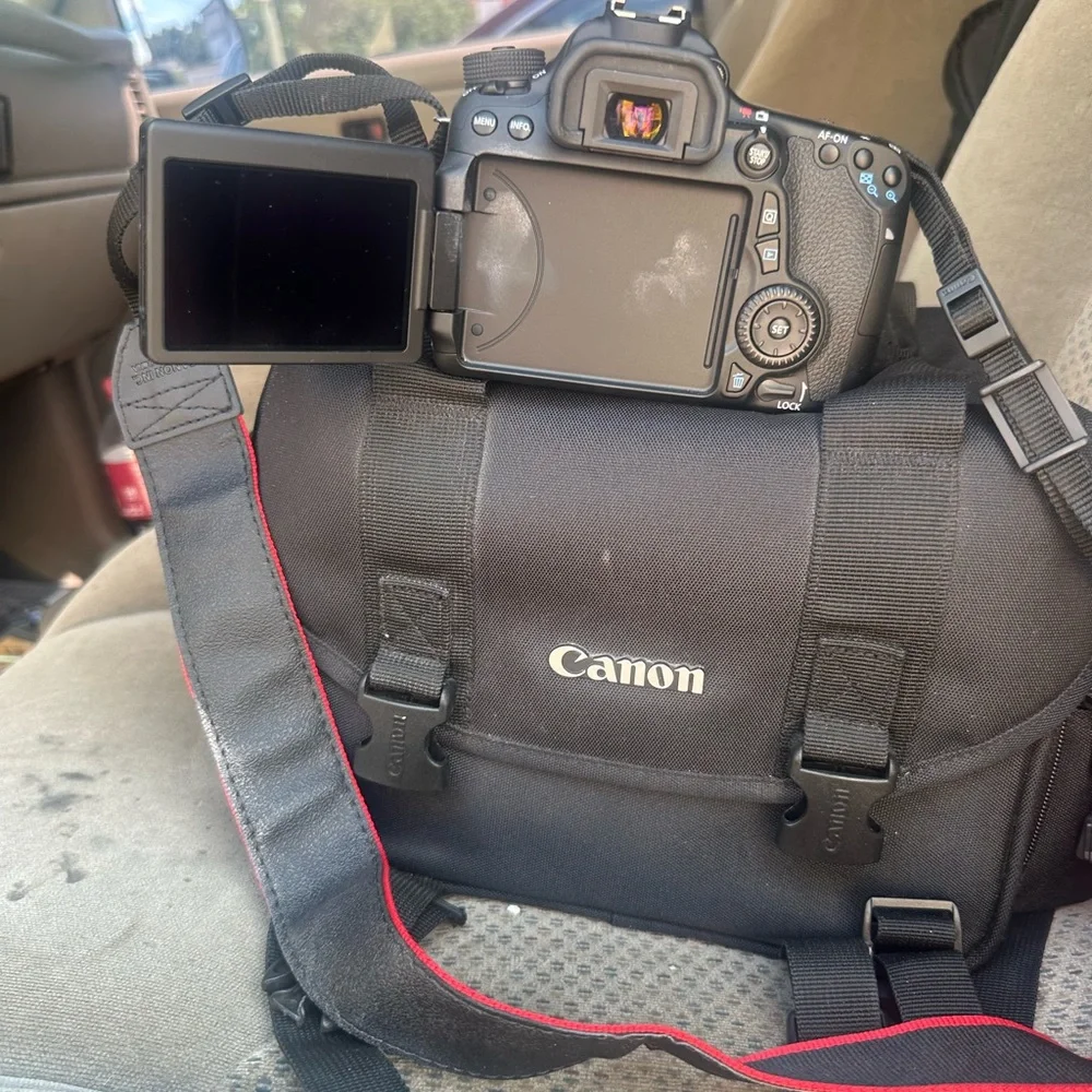 Canon Black Digital Camera with EFS 18-135mm Lens